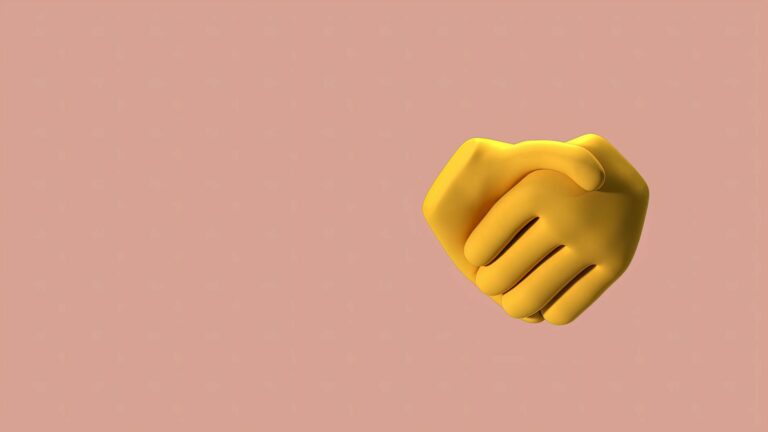 main levée en signe de salutation sur fond coloré ambiance numérique emoji